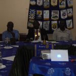 Rotary club of Hurlingham members listening attentively